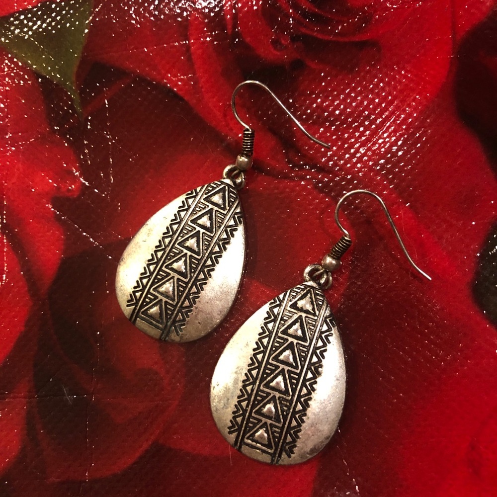 Silver earrings with etched design